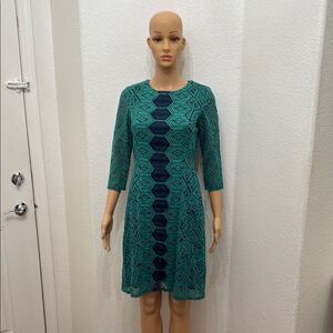 Gabby Skye Green Black Sheath Dress with 3/4 Sleeves Boat Neck Midi Floral Lace